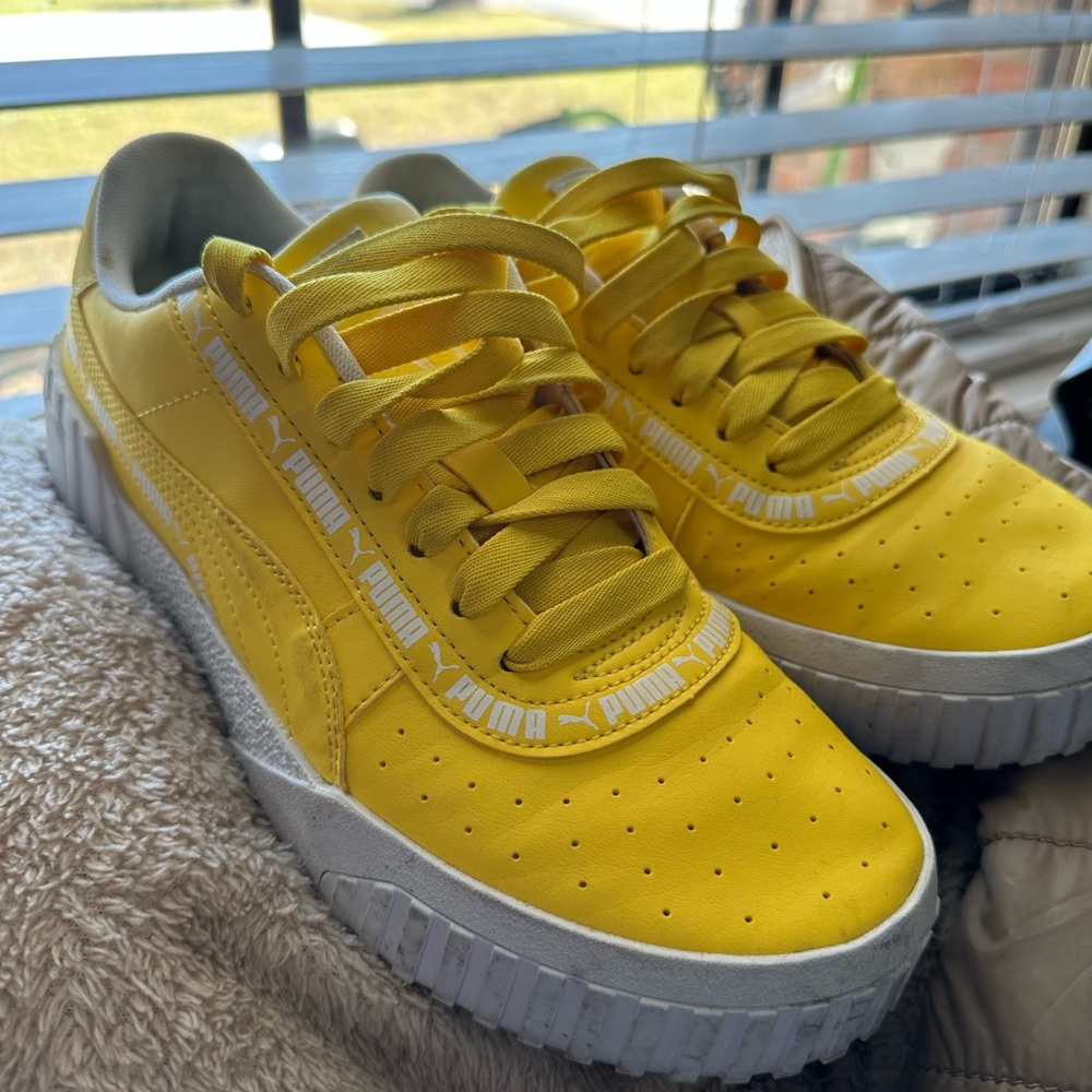 Puma yellow sneakers